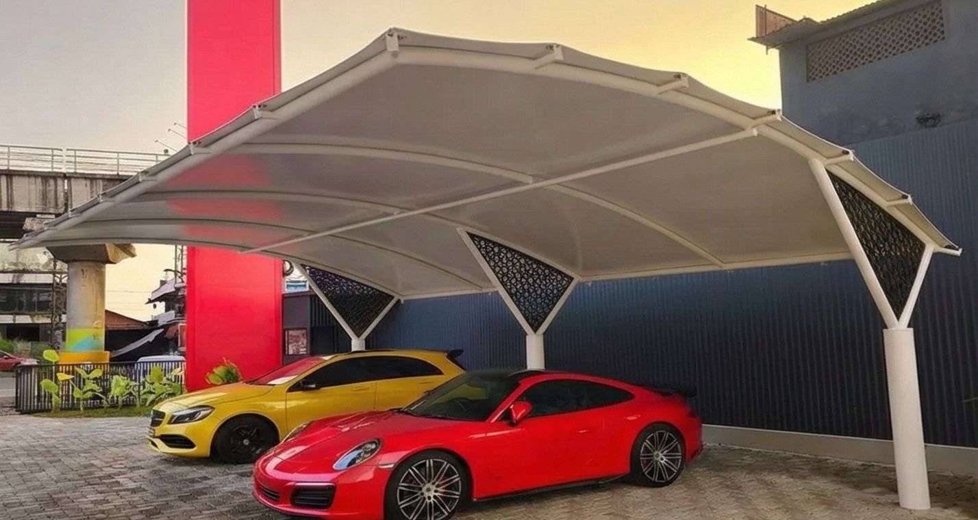 Modern tensile car porch design built in Parassala, Kerala using latest cantilever and roofing styles